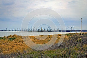 A storm surge barrier protects the land from the sea.