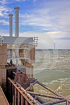 A storm surge barrier protects the land from the sea. photo