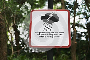 Storm warning sign in a park