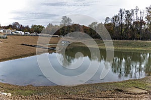 Storm water drainage pond on construction site photo