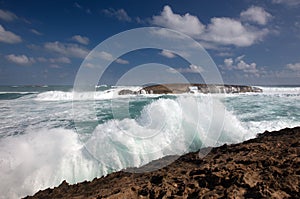 Storm waves crashing into Laie Point coastline at Kaawa on the North Shore of Oahu Hawaii United States