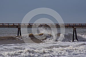 Storm Waves pummel the Rincon pier, at Mussel Shoals following the heavy rains