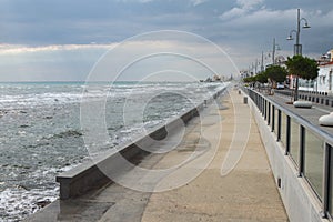 Storming sea and city embankment. Larnaca, Cyprus