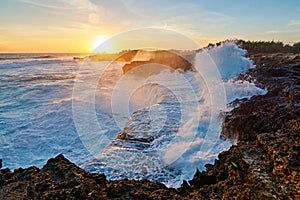 Storming Sea Waves Crashing on the Shore at Sunset