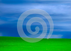 Storms and green grass grassy hills background