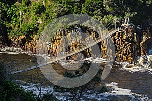 Storms river, wooden bridge in tsitsikamma national park. South Africa tourism