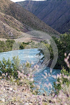 Stormy Chilik River in the steppes of Kazakhstan