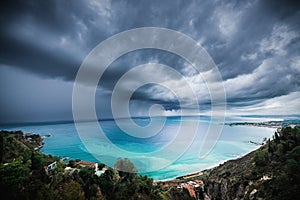 Stormy clouds above Mediterranean sea. View from Taormina city in Sicily, Italy