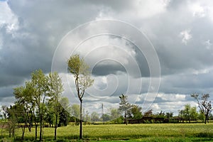 Stormy clouds over the agricultural landscape in the countryside of Punjab province