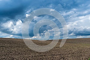 Stormy clouds over the field