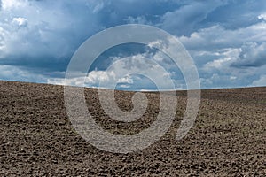 Stormy clouds over the field