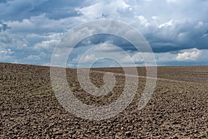 Stormy clouds over the field