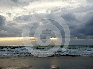 Stormy clouds over the sea, photographed at Bloubergstrand, South Africa photo