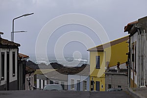 Stormy day in the Azores. Colorful houses in Ribeira Seca. Sao Miguel island, Azores photo