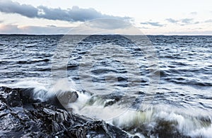 Stormy day next to lake in December in Finland