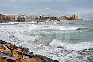 Stormy Mediterranean sea, city beach of Torrevieja
