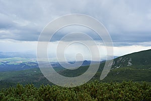 Stormy and rainy clouds and rain in Slovakian part of High tatras mountains.