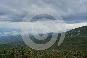 Stormy and rainy clouds and rain in Slovakian part of High tatras mountains.