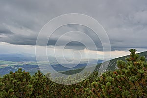 Stormy and rainy clouds and rain in Slovakian part of High tatras mountains.