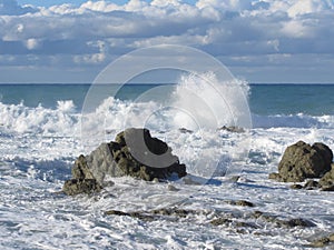 Stormy sea along Tuscany coastline in Livorno, Italy