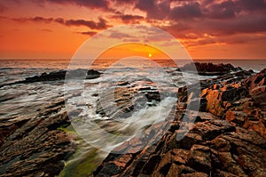 Stormy sea at sunrise