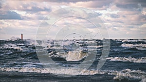 Stormy sea in winter with white waves crushing - vintage film lo