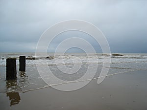 Stormy skies across a beach