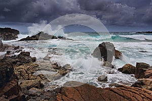 Stormy skies over rugged coastline