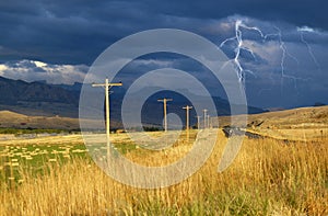 A stormy sky with bolts of lightning looks ominous of dangerous weather to come.