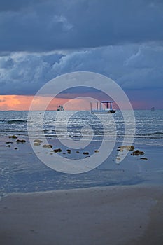 Stormy sky early in the morning in Japaratinga beach, Alagoas, Brazil