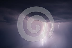 Stormy sky with lightning strikes and thunderstorm clouds