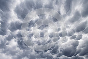 Stormy sky with menacing mammatus clouds photo