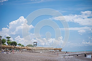 Stormy sky over the sea deserted beach. Bad weather at sea. Off Season