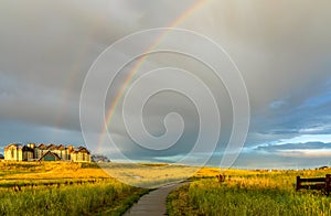 The stormy sky and rainbow above the new Gaylord Rockies Resort and Convention Center in Denver