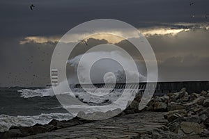 Stormy sunset at the river mouth