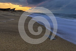 Stormy sunset on the sea coast