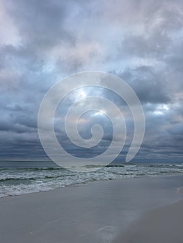 Stormy sunset skies over the Gulf of Mexico in Miramar Beach Florida