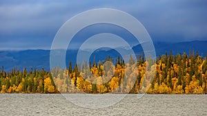 Stormy weather over the Khibiny mountains. The first snow on the top of the rocks