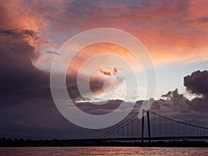 Stormy weather at sundown over the rhine, Emmerich, Germany