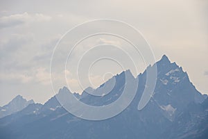 Stormy weather and wildfire smoke over Jackson Lake, Grand Teton National Park, USA photo