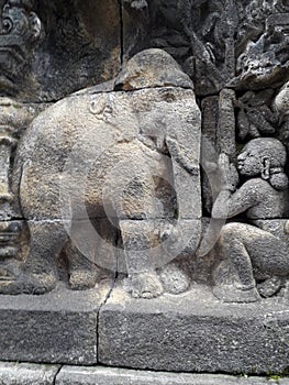 the art of sculpting, the history of the Borobudur Temple, a thousand mystery stories, Central Java, Indonesia photo