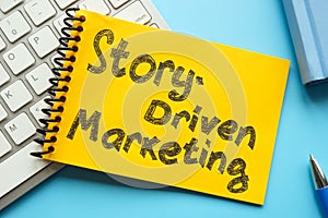 Story-driven marketing. The notepad is on the keyboard. photo