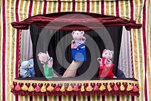 Story of the three little pigs and the big bad wolf with hand puppets