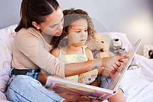 Storytelling, book and mother with daughter in bedroom for teaching, fantasy or creative in bed. Education, learning and
