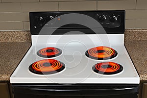 Stove Top With All Burners On High photo