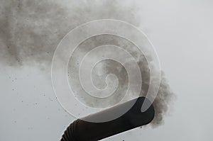 Stovepipe belching smoke photo