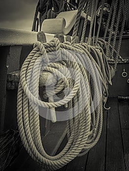 Stowed ropes on sailing ship photo