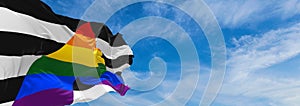 Straight Ally flag waving in the wind at cloudy sky. Freedom and love concept. Pride month. activism, community and freedom photo