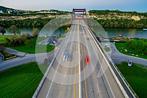 Straight On Angle Aerial Pennybacker Bridge at sunset with cars showing motion from Long Exposure taken by Drone