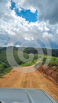 Straight country road in mountain landscape at Serra da Canastra, Minas Gerais, Brazil
